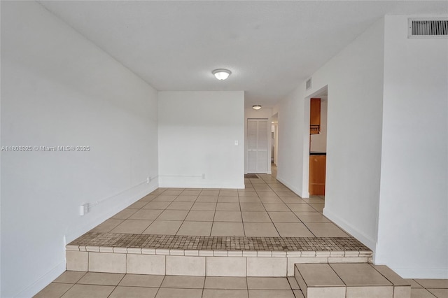 1551 NW 92nd Ave Unit 185, Pembroke Pines, FL 33024 - tiled spare room with baseboards