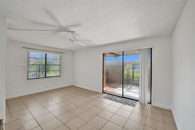 1551 NW 92nd Ave Unit 185, Pembroke Pines, FL 33024 - unfurnished room with plenty of natural light, ceiling fan, light tile patterned floors, a textured ceiling, and baseboards