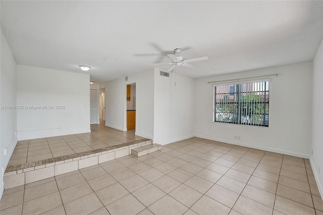1551 NW 92nd Ave Unit 185, Pembroke Pines, FL 33024 - empty room with a ceiling fan, tile patterned flooring, and baseboards
