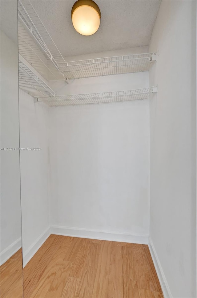 1551 NW 92nd Ave Unit 185, Pembroke Pines, FL 33024 - spacious closet with wood finished floors