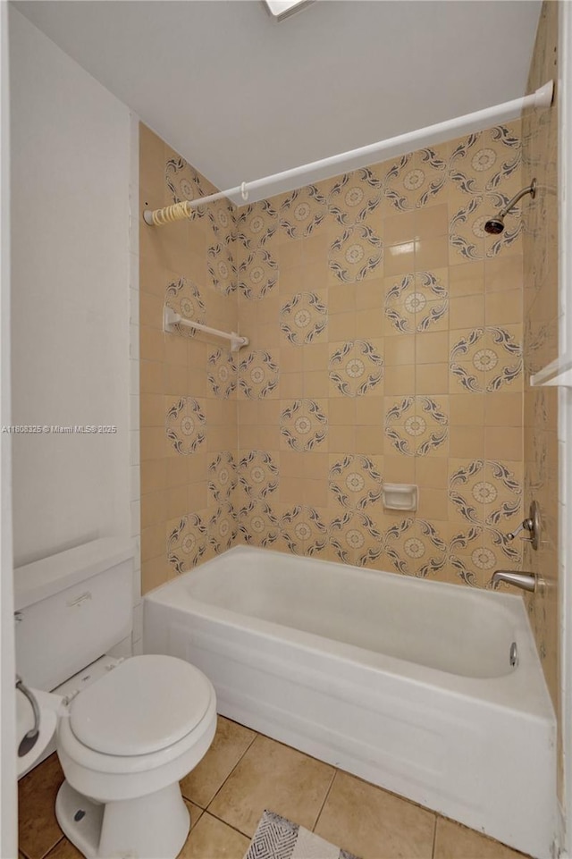 1551 NW 92nd Ave Unit 185, Pembroke Pines, FL 33024 - bathroom with bathing tub / shower combination, toilet, and tile patterned floors