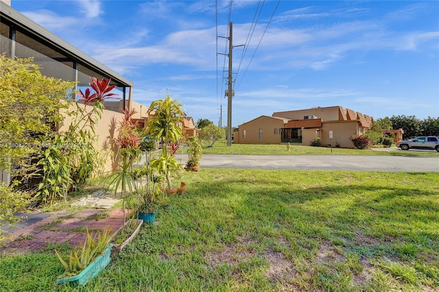1551 NW 92nd Ave Unit 185, Pembroke Pines, FL 33024 - view of grassy yard