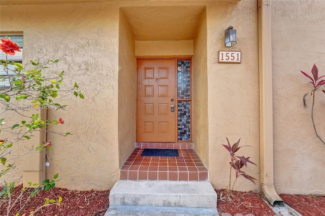1551 NW 92nd Ave Unit 185, Pembroke Pines, FL 33024 - doorway to property featuring stucco siding