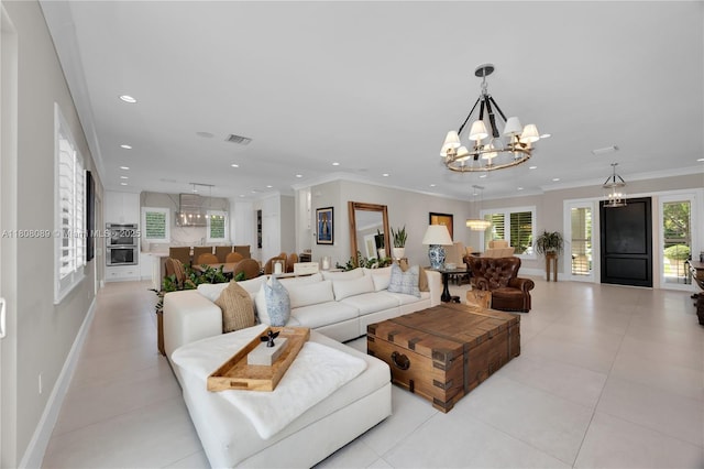 7495 SW 105th Ter, Pinecrest, FL 33156 - living room with a chandelier, recessed lighting, baseboards, light tile patterned floors, and ornamental molding