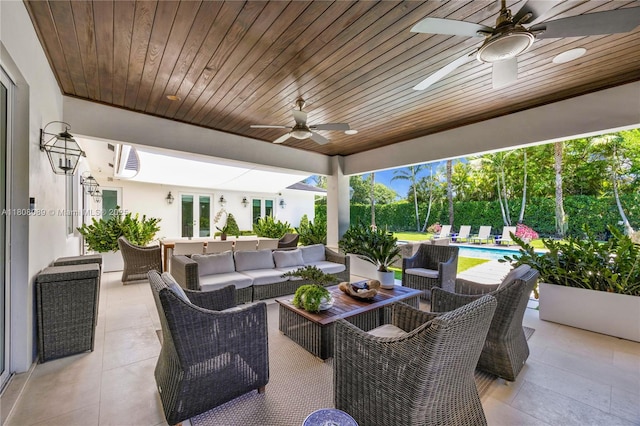 7495 SW 105th Ter, Pinecrest, FL 33156 - view of patio / terrace with a ceiling fan, an outdoor hangout area, and french doors