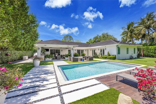 7495 SW 105th Ter, Pinecrest, FL 33156 - view of pool featuring an outdoor hangout area, a yard, and a patio
