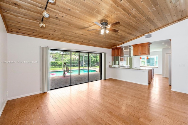 9919 SW 1st Ct, Coral Springs, FL 33071 - unfurnished living room with vaulted ceiling, wood ceiling, light wood finished floors, baseboards, and a ceiling fan
