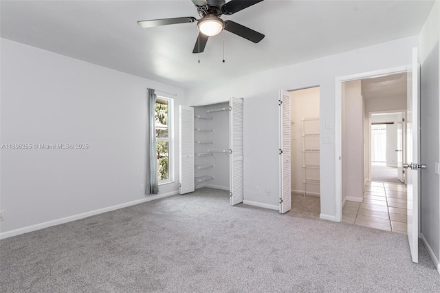 9919 SW 1st Ct, Coral Springs, FL 33071 - unfurnished bedroom with carpet floors, two closets, baseboards, and a ceiling fan