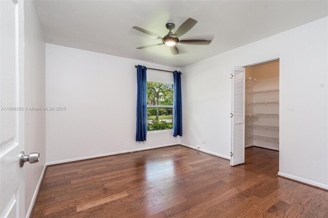 9919 SW 1st Ct, Coral Springs, FL 33071 - empty room with a ceiling fan, wood finished floors, and baseboards