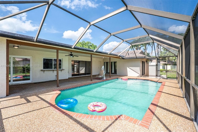 9919 SW 1st Ct, Coral Springs, FL 33071 - swimming pool featuring a patio, ceiling fan, and glass enclosure