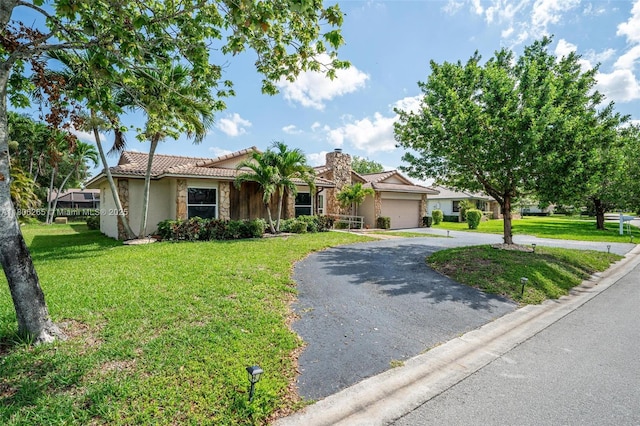 9919 SW 1st Ct, Coral Springs, FL 33071 - ranch-style home featuring stone siding, driveway, a garage, and a front lawn