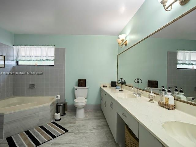 15824 Cotswold Ct, Davie, FL 33331 - full bathroom featuring a garden tub, double vanity, and toilet