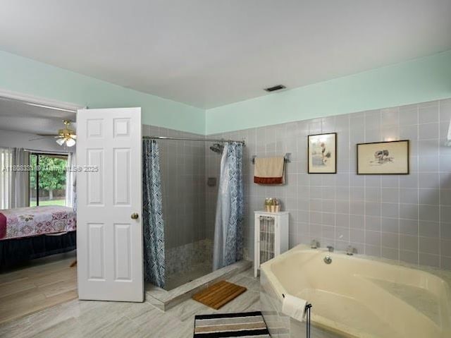 15824 Cotswold Ct, Davie, FL 33331 - ensuite bathroom featuring a garden tub, a stall shower, and a ceiling fan