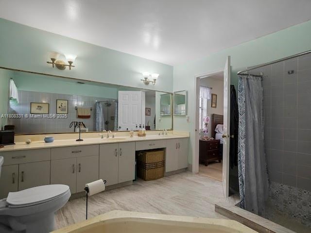 15824 Cotswold Ct, Davie, FL 33331 - full bathroom with a shower stall, double vanity, and toilet