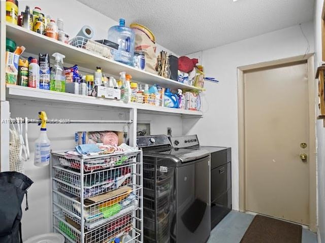 15824 Cotswold Ct, Davie, FL 33331 - washroom with washer and clothes dryer and a textured ceiling