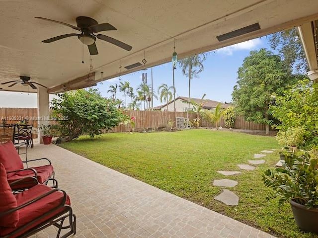 15824 Cotswold Ct, Davie, FL 33331 - view of yard with a ceiling fan and a patio area