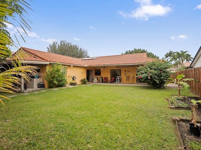 15824 Cotswold Ct, Davie, FL 33331 - rear view of property with a tile roof, stucco siding, and a patio area