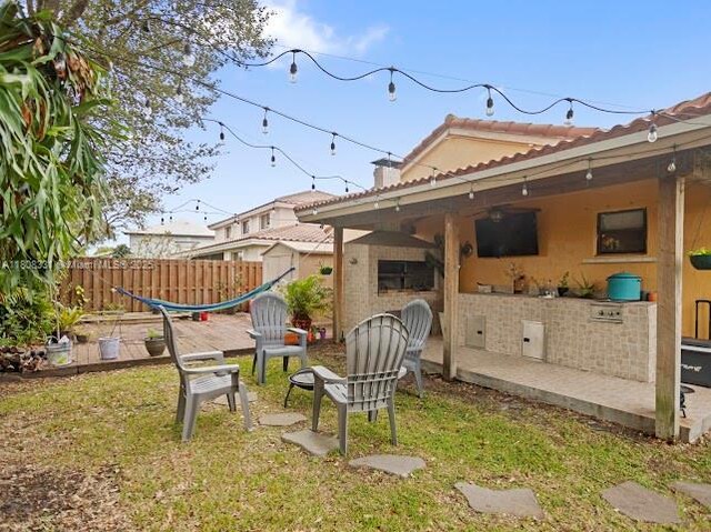 15824 Cotswold Ct, Davie, FL 33331 - view of yard featuring a patio area