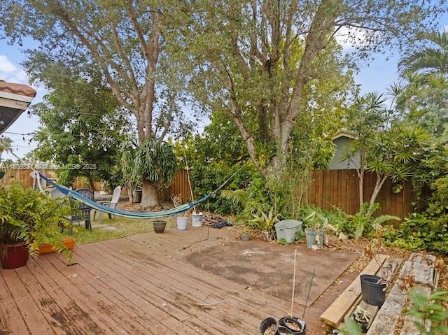 15824 Cotswold Ct, Davie, FL 33331 - wooden deck featuring a fenced backyard