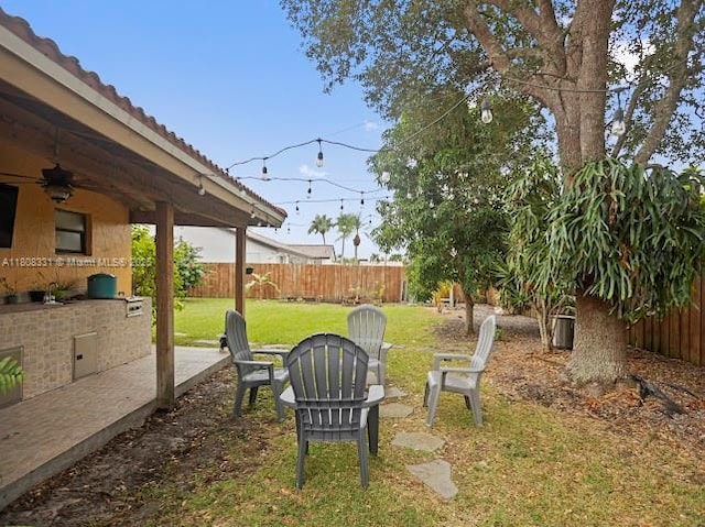 15824 Cotswold Ct, Davie, FL 33331 - view of yard with ceiling fan and area for grilling