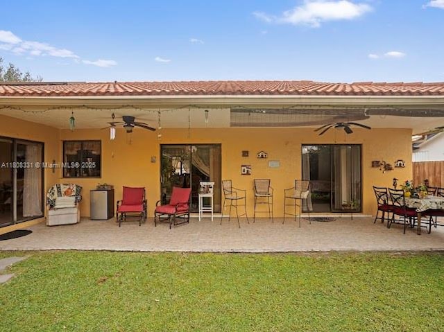 15824 Cotswold Ct, Davie, FL 33331 - rear view of house featuring ceiling fan, a patio, and stucco siding