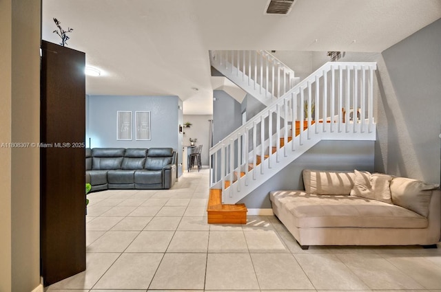 3427 W 89th Ter, Hialeah, FL 33018 - stairs with tile patterned flooring and baseboards