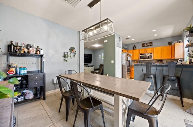 3427 W 89th Ter, Hialeah, FL 33018 - dining space with light tile patterned flooring, recessed lighting, and baseboards