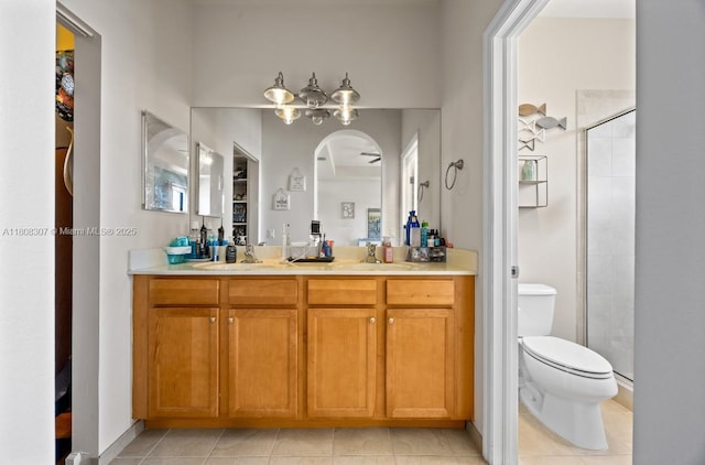 3427 W 89th Ter, Hialeah, FL 33018 - full bath featuring a shower stall, double vanity, toilet, and tile patterned floors