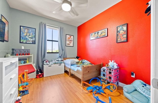 3427 W 89th Ter, Hialeah, FL 33018 - bedroom with light wood-style flooring and a ceiling fan