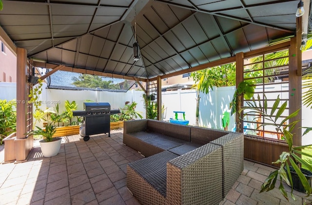 3427 W 89th Ter, Hialeah, FL 33018 - fenced backyard featuring a patio area, a gazebo, an outdoor living space, and a grill