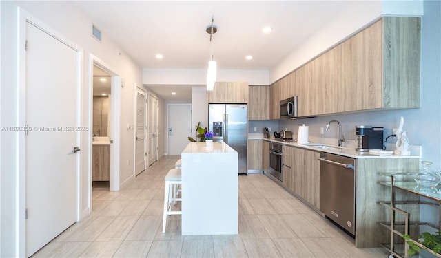 3900 Biscayne Blvd Unit S-1118, Miami, FL 33137 - kitchen with stainless steel appliances, modern cabinets, a sink, light countertops, and recessed lighting