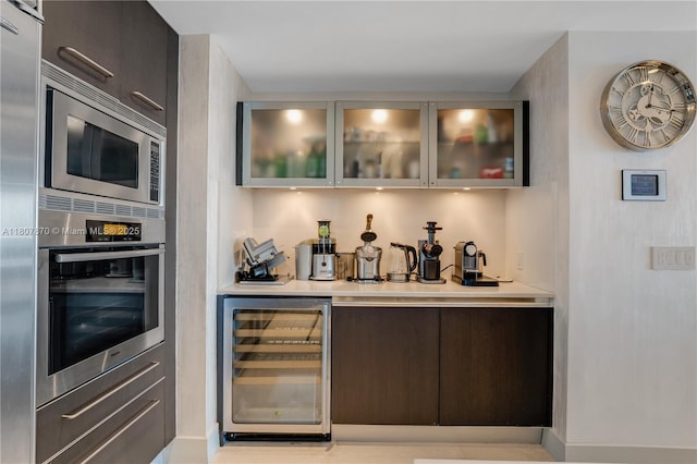 17001 Collins Ave Unit 2501, Sunny Isles Beach, FL 33160 - indoor bar featuring beverage cooler and appliances with stainless steel finishes