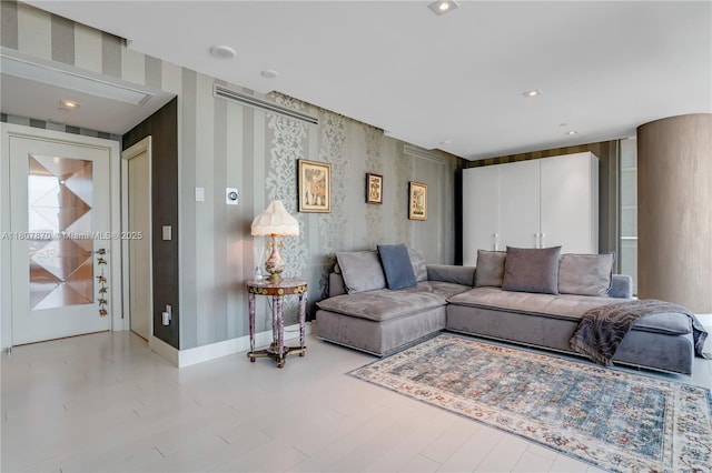 17001 Collins Ave Unit 2501, Sunny Isles Beach, FL 33160 - living room featuring baseboards and wood finished floors