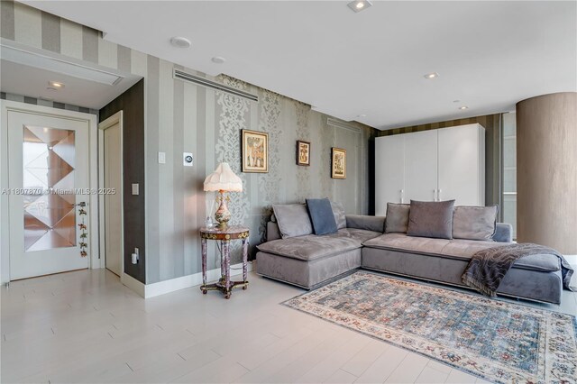 17001 Collins Ave Unit 2501, Sunny Isles Beach, FL 33160 - living room featuring baseboards and wood finished floors