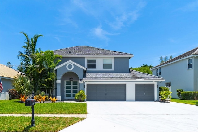 9192 Picot Ct, Boynton Beach, FL 33472 - traditional-style house with stucco siding, concrete driveway, a garage, and a front lawn