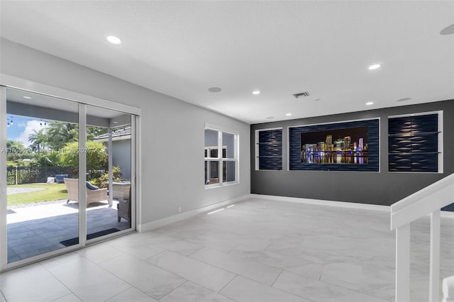9192 Picot Ct, Boynton Beach, FL 33472 - spare room with recessed lighting, marble finish floors, and baseboards