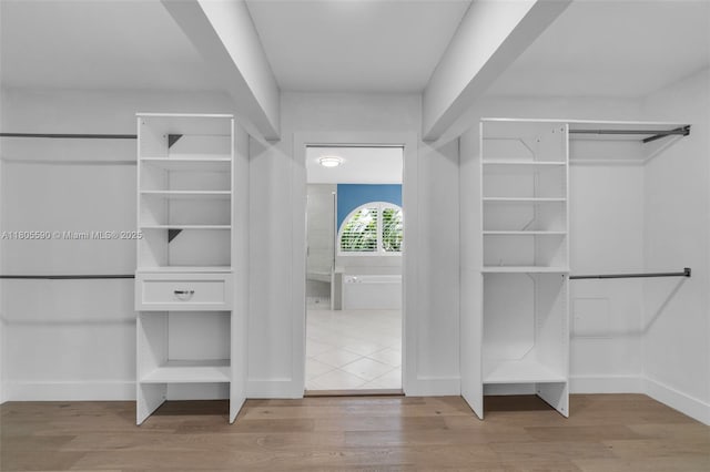 9192 Picot Ct, Boynton Beach, FL 33472 - walk in closet featuring wood finished floors