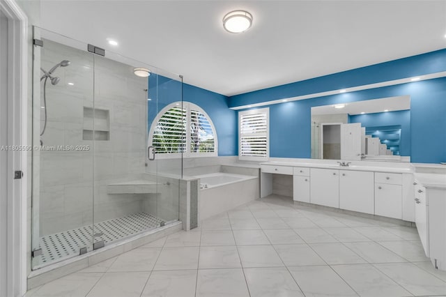9192 Picot Ct, Boynton Beach, FL 33472 - bathroom with vanity, a bath, and a stall shower