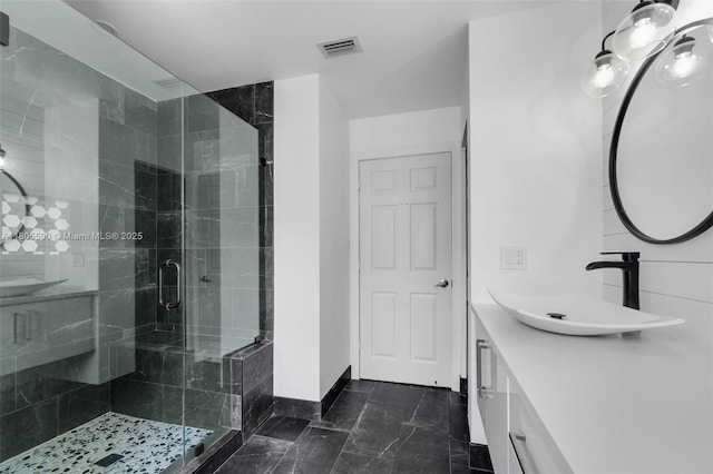 9192 Picot Ct, Boynton Beach, FL 33472 - bathroom featuring vanity, a shower stall, and baseboards