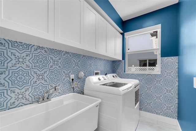 9192 Picot Ct, Boynton Beach, FL 33472 - laundry room featuring washing machine and clothes dryer and cabinet space
