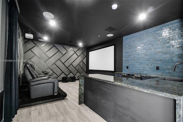 9192 Picot Ct, Boynton Beach, FL 33472 - cinema room with a sink, wood finished floors, and recessed lighting
