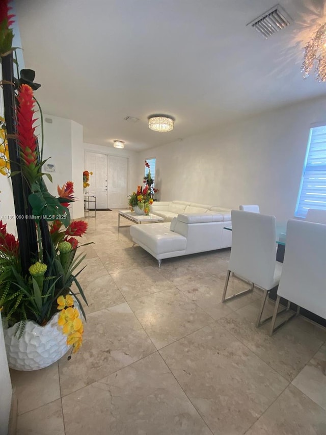 3406 W 88th St, Hialeah, FL 33018 - living area featuring light tile patterned floors
