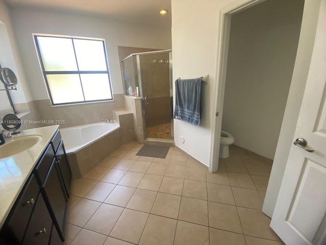 3406 W 88th St, Hialeah, FL 33018 - full bathroom with a bath, a stall shower, tile patterned flooring, and vanity