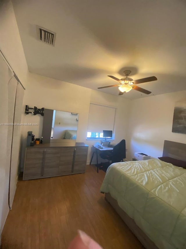3406 W 88th St, Hialeah, FL 33018 - bedroom with wood finished floors and ceiling fan