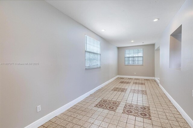 2240 NW 47th Ter, Lauderhill, FL 33313 - unfurnished room with recessed lighting, baseboards, and light tile patterned floors