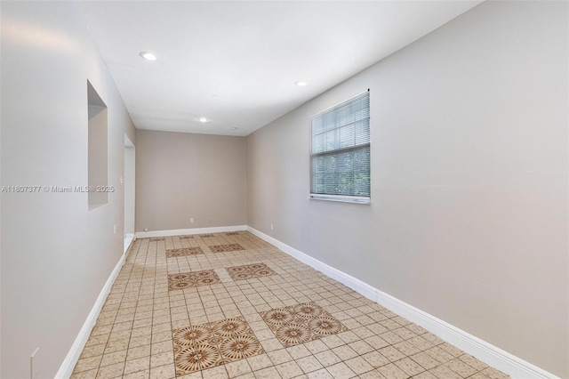 2240 NW 47th Ter, Lauderhill, FL 33313 - unfurnished room with light tile patterned floors, recessed lighting, and baseboards