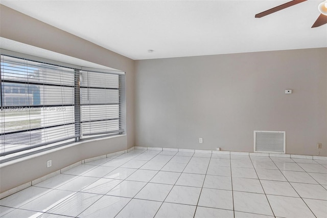 2240 NW 47th Ter, Lauderhill, FL 33313 - spare room with a ceiling fan and light tile patterned flooring