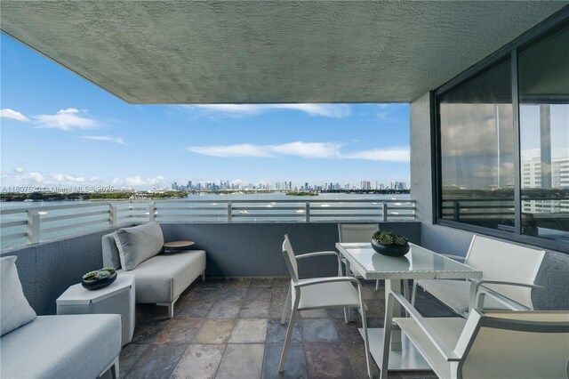 1330 W Ave Unit 902, Miami Beach, FL 33139 - balcony featuring a view of skyline and a water view