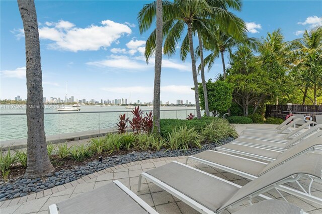 1330 W Ave Unit 902, Miami Beach, FL 33139 - view of patio featuring a view of skyline and a water view
