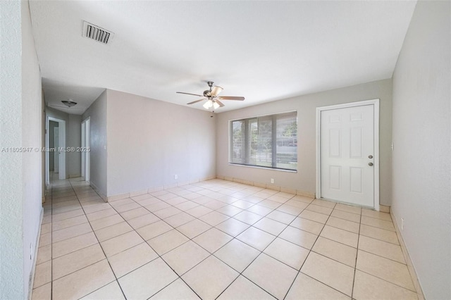 6871 SW 18th St, North Lauderdale, FL 33068 - spare room with ceiling fan and light tile patterned flooring